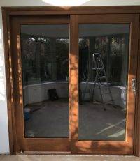 Sliding external wooden doors