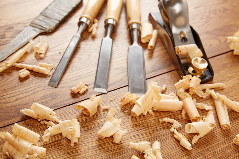 Bespoke joinery tools being used to cut wood