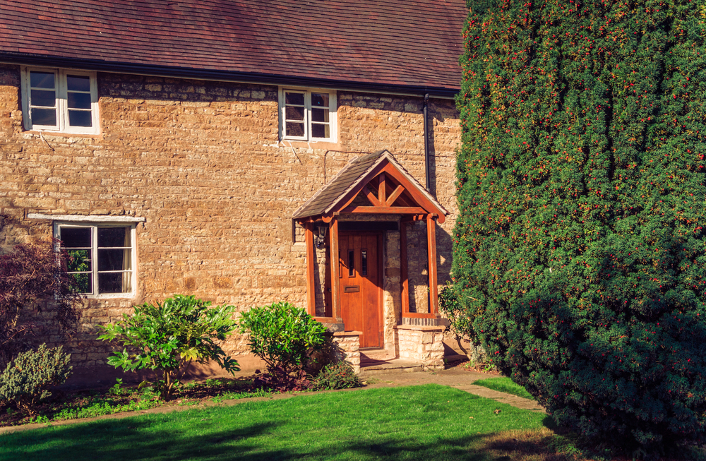 bespoke entrance with a wooden porch