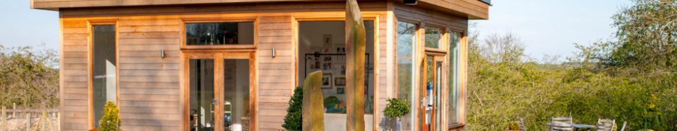 Long shot of a garden room on a summers day