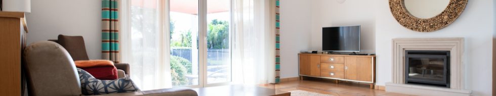 Sliding wooden doors shot from the inside of a home