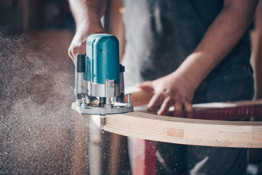 Joinery cutting wood with cutting gun.